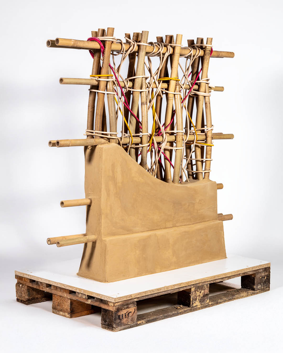 We are excited to launch a new research line for the Professorship!

With much of future global construction happening in growth regions, Africa presents immense potential for innovative and sustainable building methods.

Last semester, we initiated a long-term international engagement with our MSc Studio Common Futures, exploring how African vernacular architecture can be upscaled for multi-storey housing.

Students engaged with experts on vernacular architecture, material cycles, and local economies, gaining insights into diverse construction traditions. Through ongoing collaboration with local partners, they developed experimental circular construction concepts, assessing their feasibility for rapid implementation and long-term sustainable impact.

These concepts were explored through experimental prototypes and digital workflows, evaluating design potential, material availability, local production, and economic integration.

Images 1-3: BambooBend
Silas Schmidt, Alexander Pfleiderer, Eva Kasbauer, Lea Wolf
Inspired by wattle and daub techniques, BambooBend reimagines structures using pre-bent bamboo and rattan connections. This modular system supports sustainable multi-storey housing while fostering reforestation and local craftsmanship.

Images 4-6: Clastics
Alina Sophie Behrend, Niclas Zumholte, Julien Fünfgeld
Clastics fuses recycled plastic waste with earth to create durable, low-cost housing. Designed for self-building and refugee settlements, it reduces landfills and improves living conditions.

Images 7-9: Bagasse Brick
Ran Cheng, Sophie Weiss, Wanxin Liu
Bagasse Brick transforms sugarcane byproducts into interlocking bricks for affordable construction, reducing CO₂ emissions and expanding the sugar industry’s value chain while generating jobs.

@kitarchitektur 

#SustainableConstruction #CircularEconomy #VernacularArchitecture #CommonFutures #Innovation #DigitalFabrication #greenbuilding #DigitalCircularConstruction #Bamboo #Earth